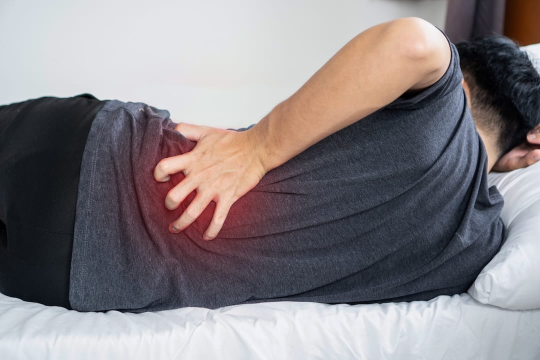 man with sciatica pain